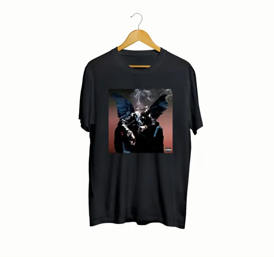 Discover Travis Birds in the Trap Sing McKnight T-Shirt