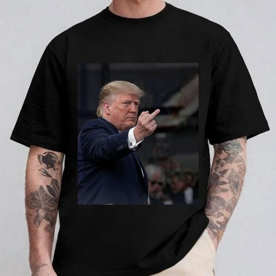Discover Middle Finger Trump T-Shirt with Meme Graphic, Trump Reacting to Heckler at Ford Plant