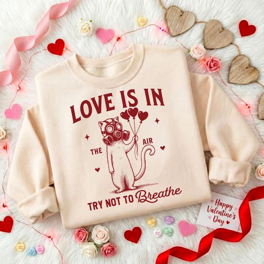 Discover Love Is In The Air Try Not To Breathe Sweatshirt, Valentine Funny Cat T-Shirt, Gas Mask Cat Tee, Humorist Valentine Hoodie, Valentine Shirt