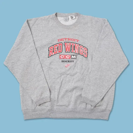 Discover NHL Detroit Red Wings Reprinted Ash Crewneck Sweatshirt