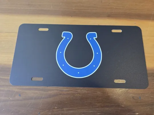 Discover INDIANAPOLIS COLTS BLACK ALUMINUM football 6X12 LICENSE PLATE.  NEW