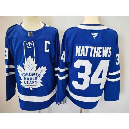 Discover NHL 2025-2026 Toronto Maple Leafs Auston Matthews 34 Sewn Jersey Large Blue NWT