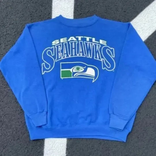 Discover football Seattle Seahawks Champions graphic royal color Sweatshirt