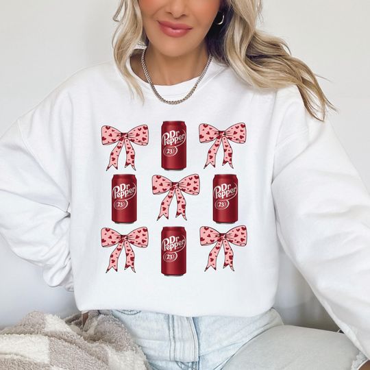 Discover Coquette Dr Pepper Soda Sweatshirt, Dr Pepper Pink Bow Heart Design Sweatshirt
