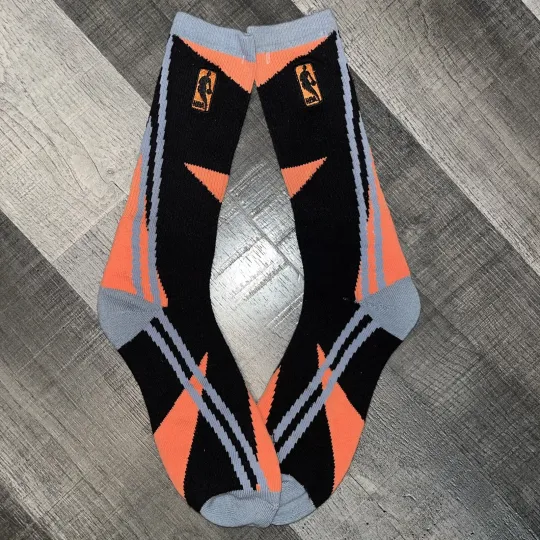 Discover NBA LOGO MAN BASKETBALL BLACK ORANGE STREAK LOGO CREW LENGTH SOCKS LARGE