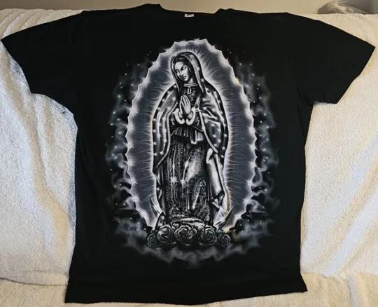 Discover OUR LADY OF GUADALUPE VIRGIN MARY ROSE FLOWER PRAY VIRGEN MORENA T-SHIRT
