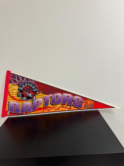 Discover Toronto Raptors NBA vintage pennant from 1990s