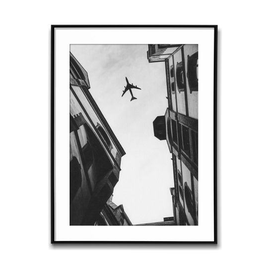 Discover Airplane Flying Over European Buildings; Black & White Wall Art Poster, Vintage Print, Photography Prints, Aesthetic Poster