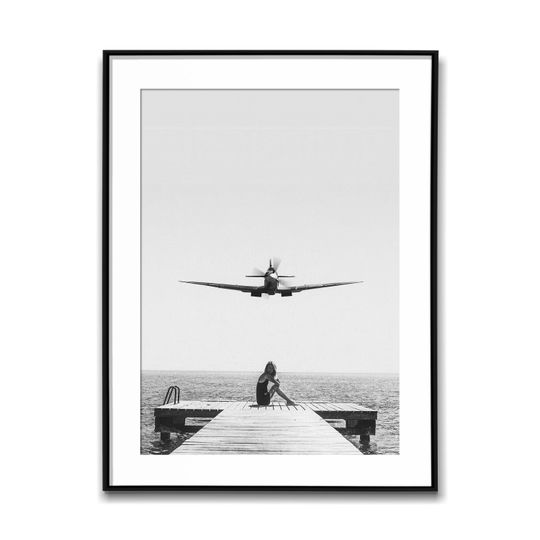 Discover Retro Airplane Flying Over A Girl Sitting By The Dock; Black & White Wall Art Poster, Vintage Print, Photography Prints, Aesthetic Poster