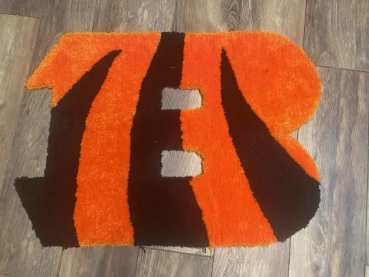 Discover Cincinnati Bengals Shaped Rug