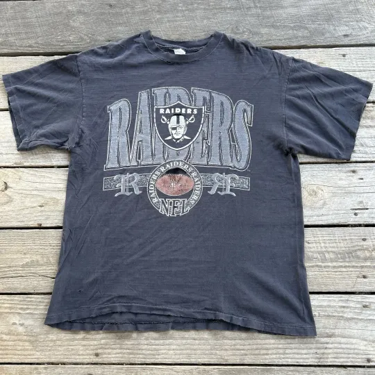 Discover Vintage 90s Oakland Raiders football Distressed Faded Black Graphic T Shirt Size XL