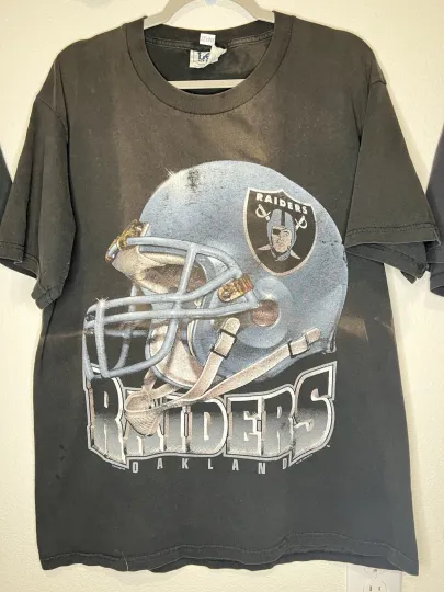 Discover Vintage 1996 Oakland Raiders football Helmets Size Large T-Shirt Crazy Fade