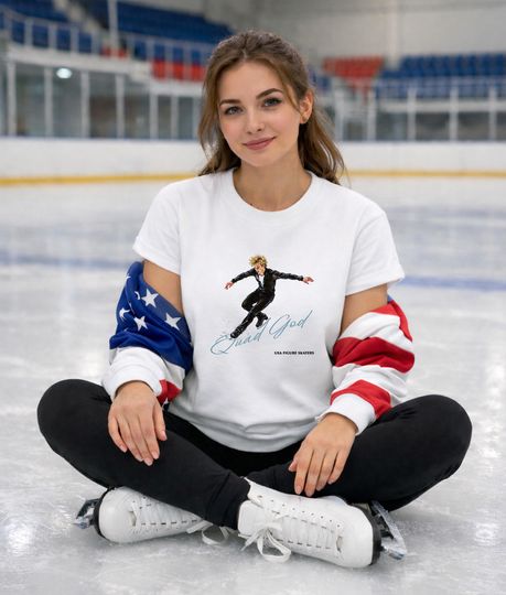 Discover Ilia Malinin Quad God Shirt | Ice Skating Fan Tee | Figure Skater Graphic Shirt | Powerful Jump Design | Milano Cortina 2026 Inspired