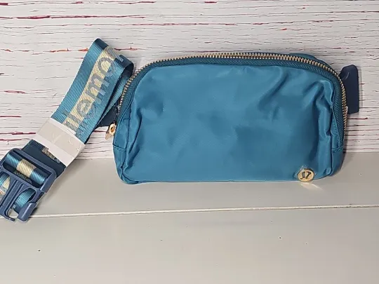 Discover NWT Lululemon Everywhere Belt Bag Teal Gold Hardware 1L