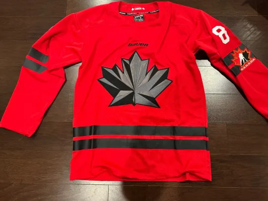 Discover Cale Makar Canada Olympics 2026 Hockey Stitched Jersey Red Large