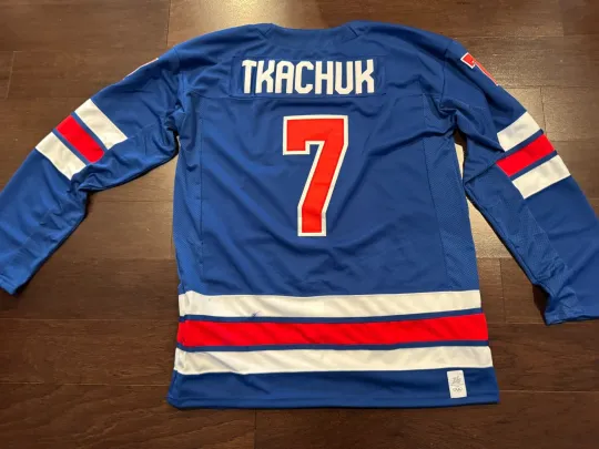 Discover Brady Tkachuk Team USA 2026 Olympics Hockey Stitched Jersey Blue Medium