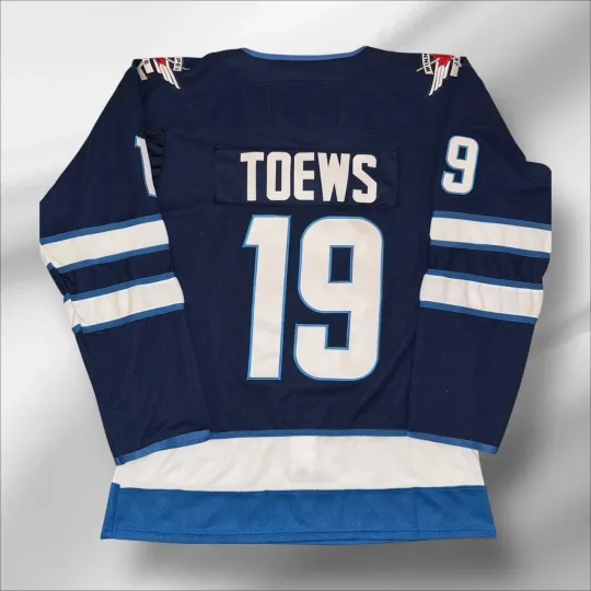 Discover Jonathan Toews Winnipeg Jets Blue Hockey Jersey