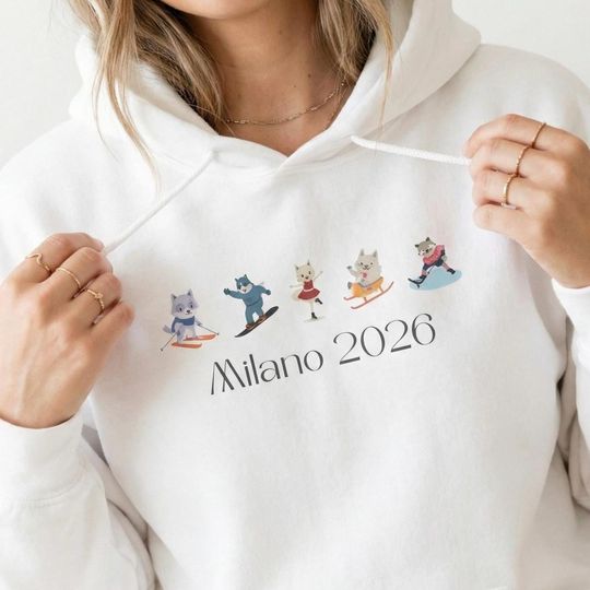 Discover Milano 2026 Winter Games Unisex Hoodie | Cute Wolf Winter Sports Sweatshirt | Skiing, Skating & Hockey Graphic | After Ski Gift