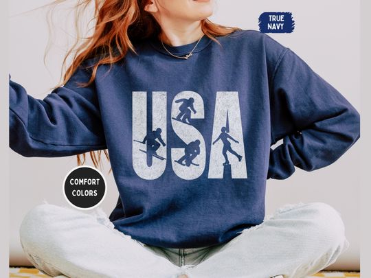 Discover USA Winter Sports 2026 Distressed Sweatshirt, Comfort Colors 1566 Crewneck, Skier Snowboarder Skater, Vintage Athletic, Unisex Multi-Color