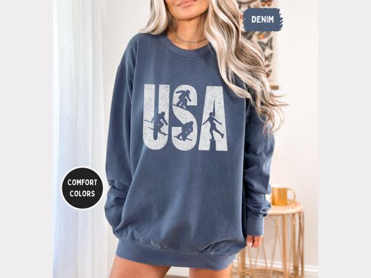 Discover USA Winter Sports 2026 Distressed Sweatshirt, Comfort Colors 1566 Crewneck, Skier Snowboarder Skater, Vintage Athletic, Unisex Multi-Color