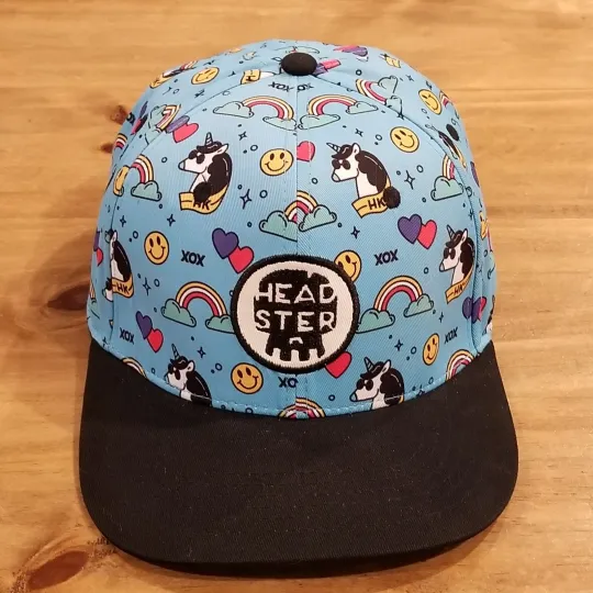 Discover Headster Kids Hat Cap Snapback AOP Unicorn Smiley Rainbows Allover 58CM One Size