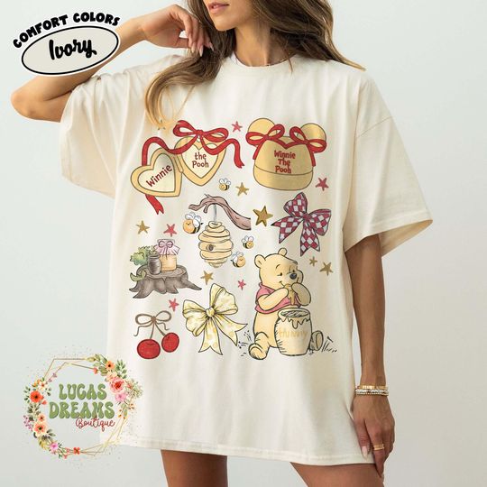 Discover Comfort Colors Coquette Bow Winnie The Pooh T-Shirt, Disney Bear Tee, Pooh and Friends Graphic T-Shirt