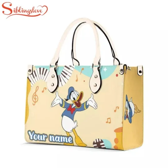 Discover Personalized Name Donald Duck Women Leather Handbag