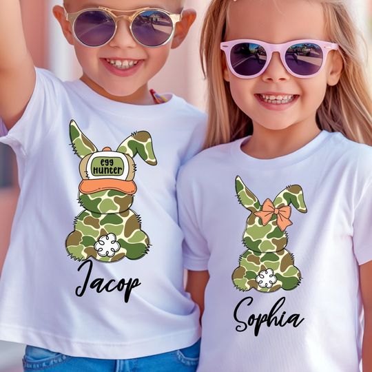 Discover Personalized Camo Egg Hunter Bunny Shirt, Easter Bunny with Bow T Shirt, Cute Coquette Camouflage Bunny Tee, Custom Kids Easter Shirt