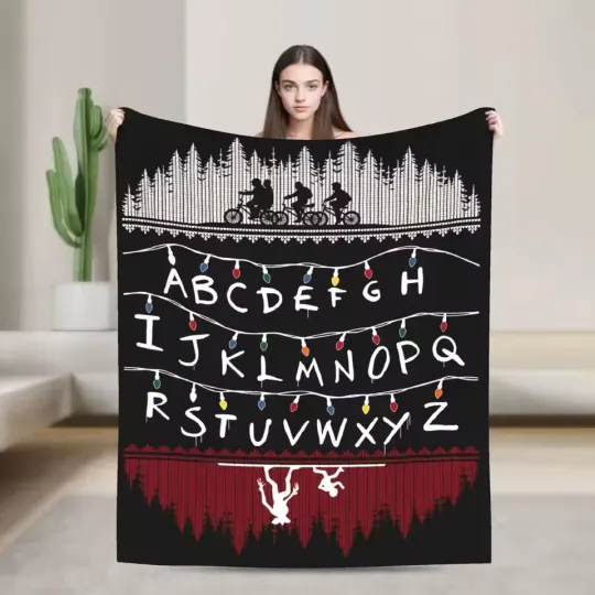 Discover Retro Alphabet Light Flannel Blanket