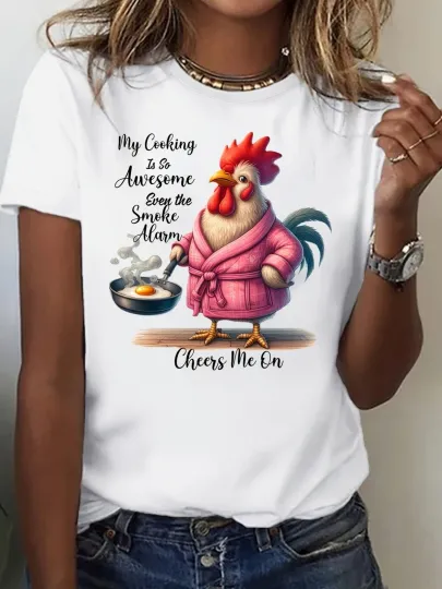 Discover [Women's T-Shirt] Fun and Quirky Graphic Tee featuring a Cartoon Rooster in Pink