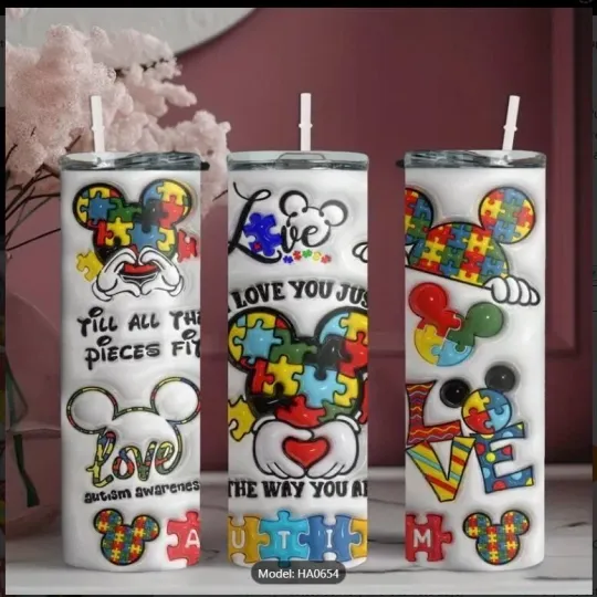 Discover Disney 20oz Stainless Steel Tumbler with Lid and Straw - Cartoon Puzzle Pattern