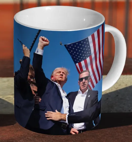 Discover Donald Trump Iconic Assassination Survival Mug - Ceramic Tea Coffee Cup