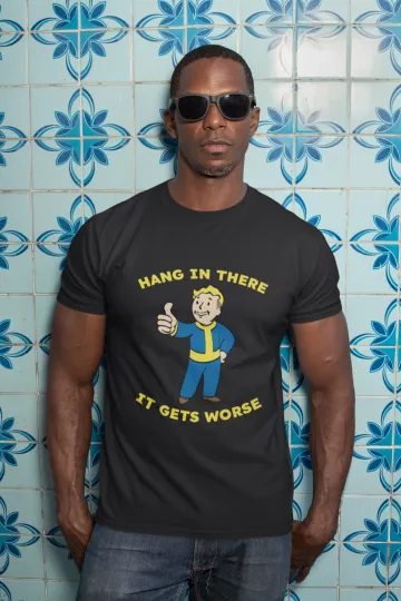Discover Falllout Vault Boy Funny T-Shirt Hang In There It Gets Worse Gamer Tee