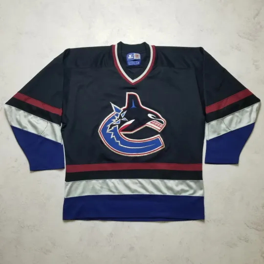 Discover Vintage Starter Vancouver Canucks Blue Orca Logo NHL Men's Hockey Jersey