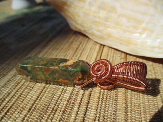 Rain forest jasper rhyolite gemstone point copper pendant