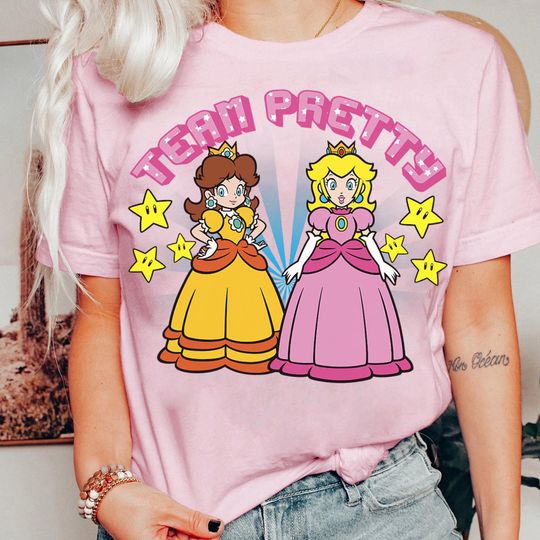 Discover Vintage Nintendo Super Mario Peach and Daisy Team T-Shirt for Gamers