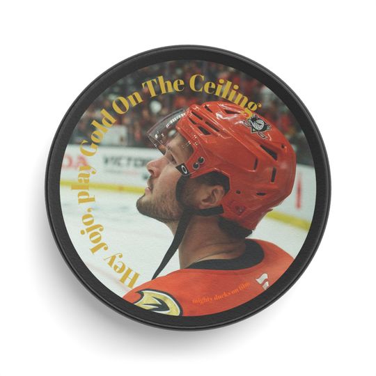 Discover Hockey Puck - Gold On The Ceiling