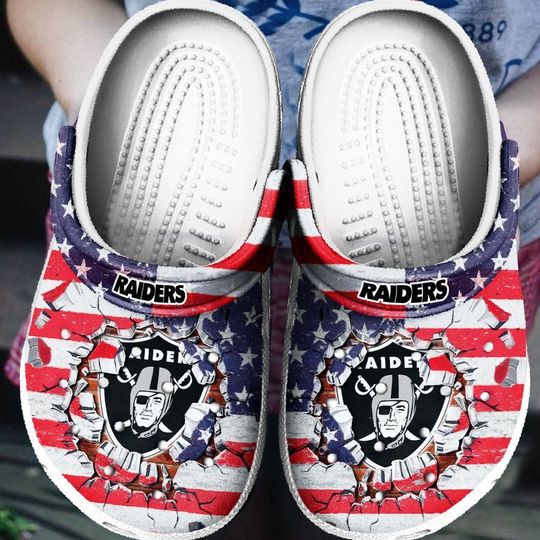 Discover football Las Vegas Raiders USA Flag Breaking Wall Clogs