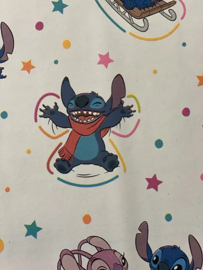 Discover Disney STITCH And ANGEL Light Blue Christmas Wrapping Paper