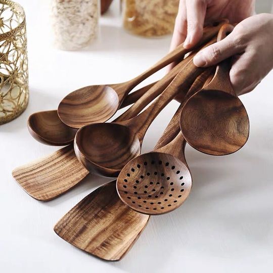 Wooden kitchen utensils set for family cooking