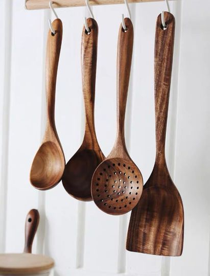 Wooden kitchen utensils set for family cooking
