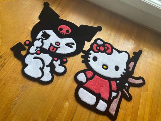 Kitty with an AK Rug