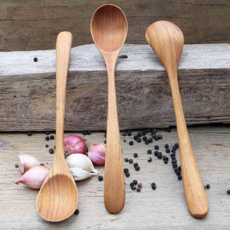Wooden spoon handmade from solid teak wood with long bended handle