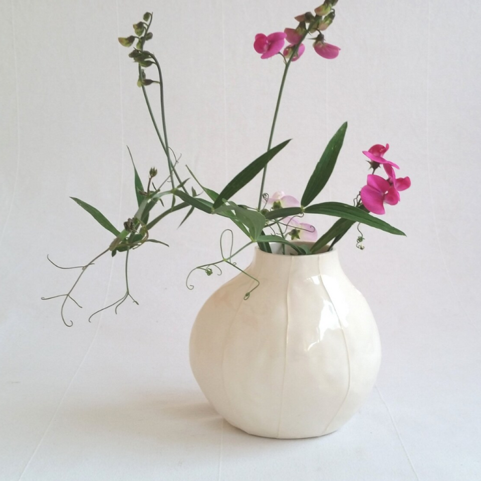 Minimalist white ceramic vase