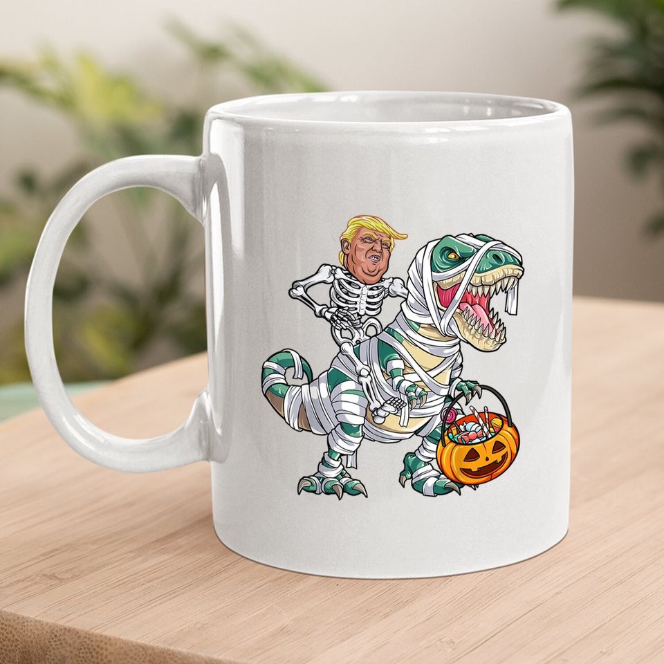 Donal Trump Riding Mummy Dinosaur T-rex Halloween Coffee Mug