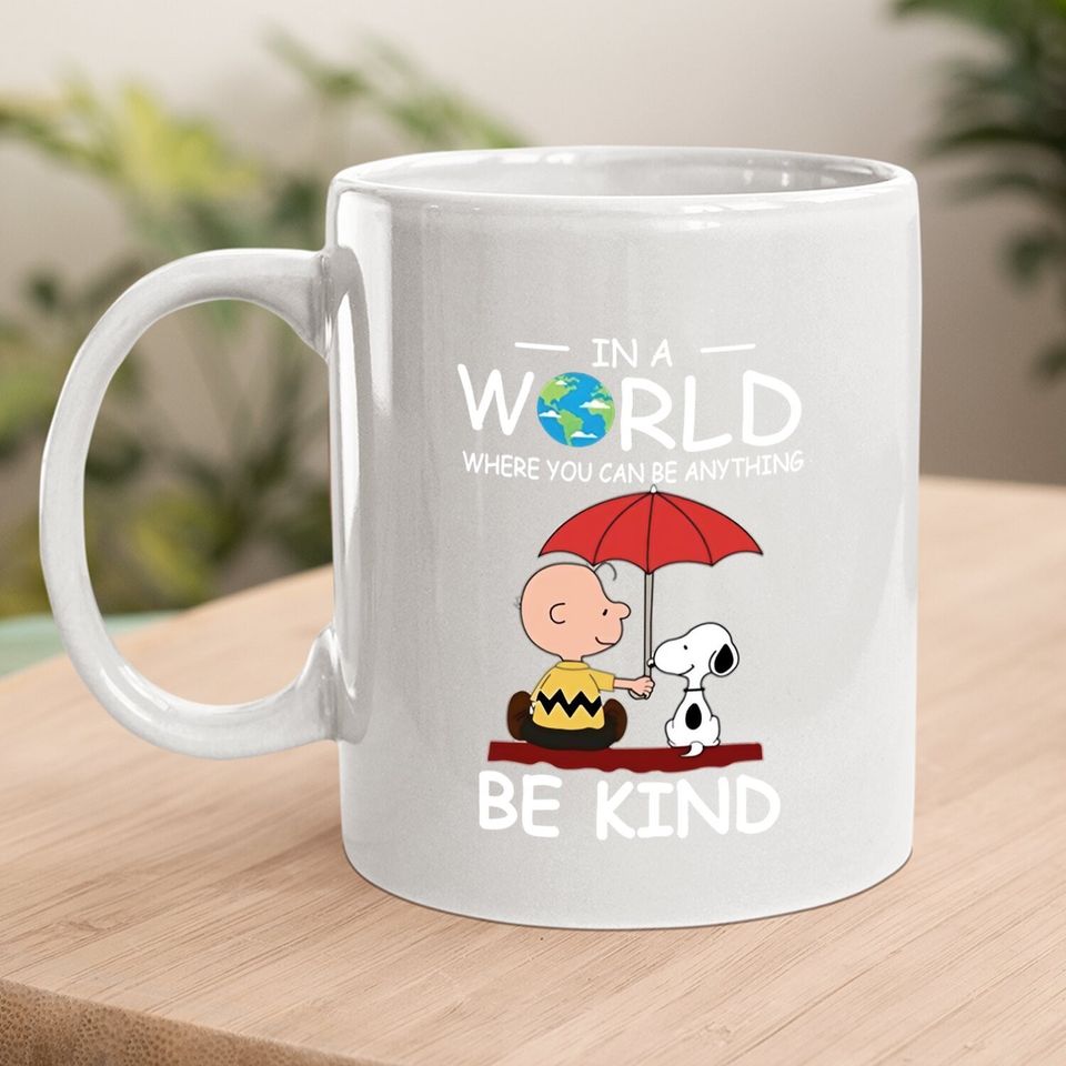 In A World Where You Can Be Anything Be Kind Brown And Snoopy Coffee Mug