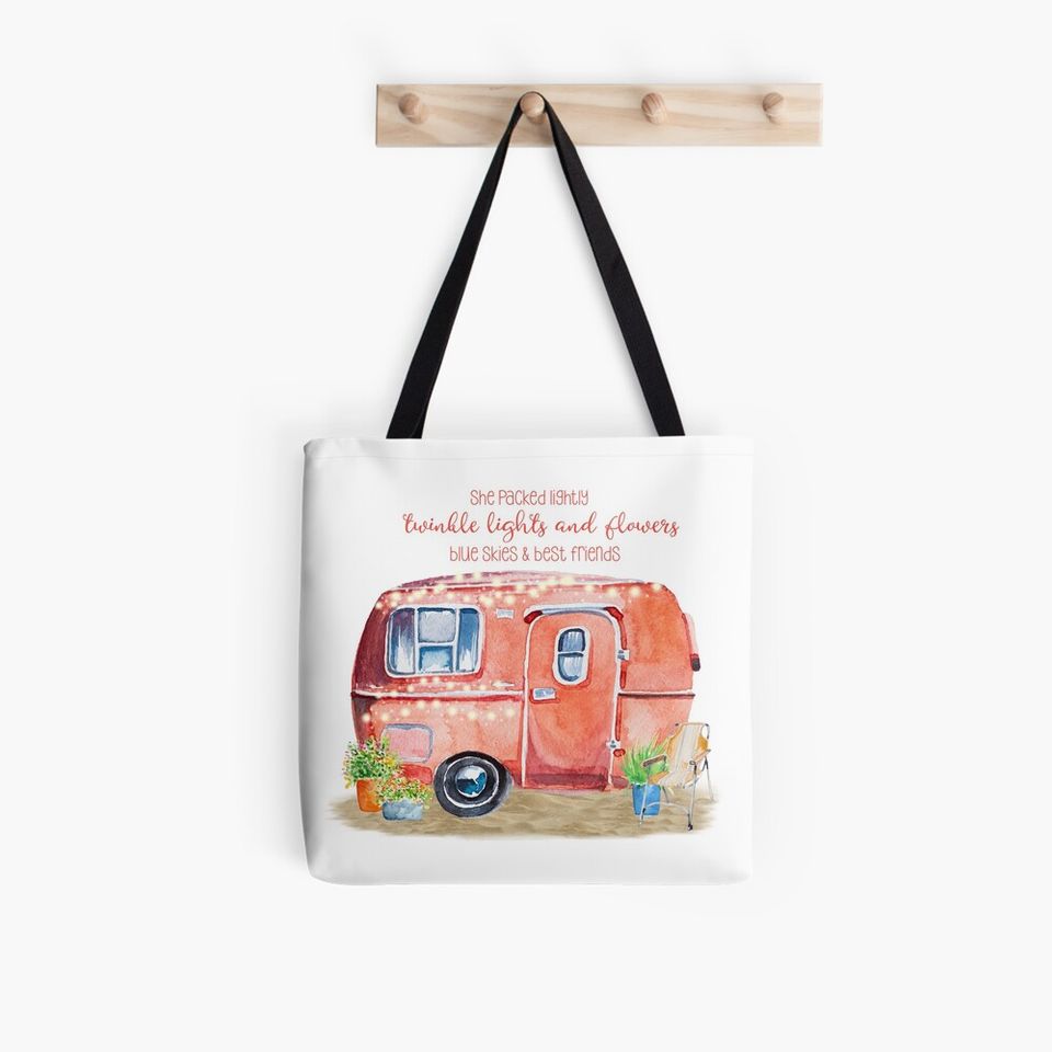 A watercolor vintage camper setting with fun quote for the lover of the glamping lifestyle tote bag