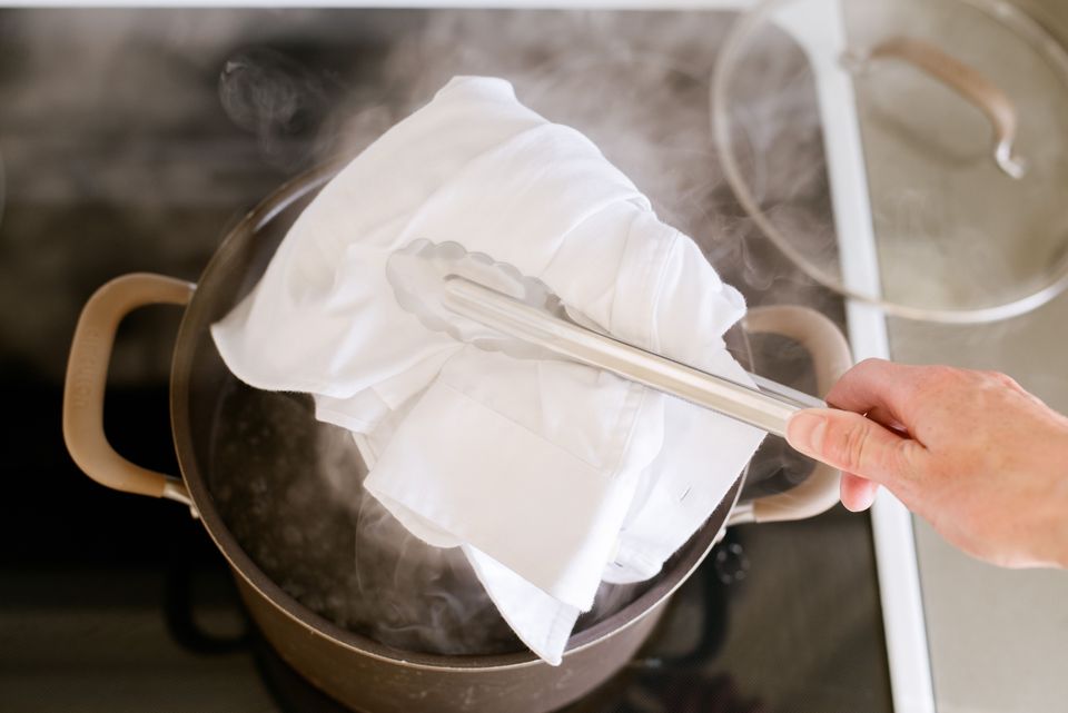 Using hot water to shrink t-shirt collar 