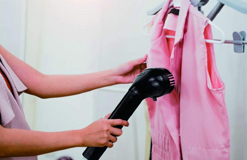 Using clothing steamer to get rid of wrinkles 