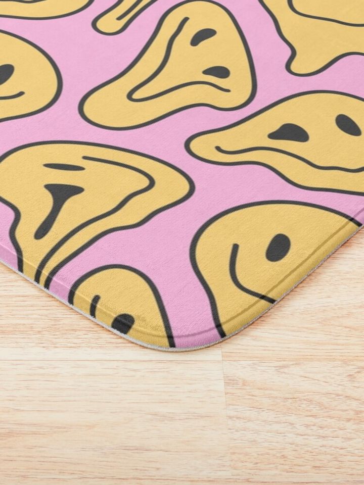 Melting smiley face Bath Mat